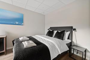 Voodi või voodid majutusasutuse Enter Skansen Hotel toas