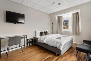 Voodi või voodid majutusasutuse Enter Skansen Hotel toas