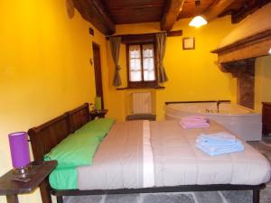Tempat tidur dalam kamar di Il Borgo Di Monica