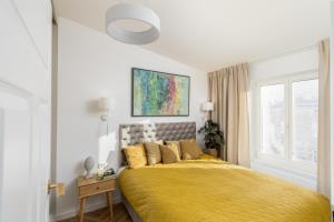 Posteľ alebo postele v izbe v ubytovaní Tyzenhauz Apartments Kazimierz