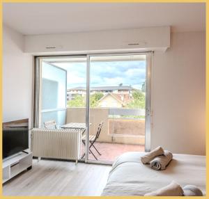 TV a/nebo společenská místnost v ubytování Le Cosy Nest I Studio I Etrembières