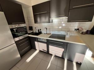 Kuchyň nebo kuchyňský kout v ubytování Apartament MATI + 23 fotografií