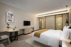 Gambar di galeri bagi Eharm Hotel Wanjiali International MALL Gaoqiao North Metro Station di Changsha