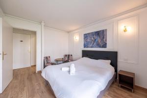 Ένα ή περισσότερα κρεβάτια σε δωμάτιο στο C5 Disney Haussmann