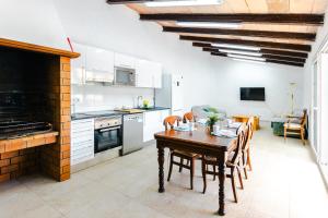 A kitchen or kitchenette at Villa Dolphin by Slow Villas
