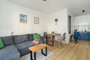 Posedenie v ubytovaní Stylish & Comfy Garbary Apartments with Parking by Noclegi Renters