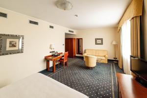 Phi Hotel Cavalieri客房内的一张或多张床位