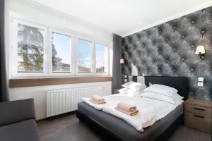 Ein Bett oder Betten in einem Zimmer der Unterkunft Villa Platinum