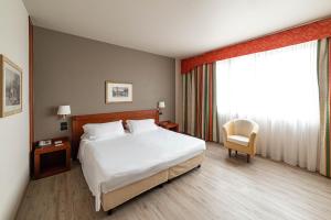 Phi Hotel Cavalieri客房内的一张或多张床位