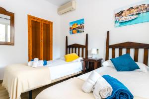 A bed or beds in a room at Villa Dolphin by Slow Villas