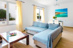 A seating area at Villa Dolphin by Slow Villas