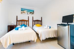 A bed or beds in a room at Villa Dolphin by Slow Villas