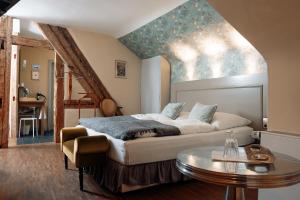 Postel nebo postele na pokoji v ubytování Friedrich von Schiller Hotel