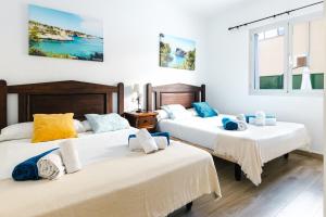 A bed or beds in a room at Villa Dolphin by Slow Villas