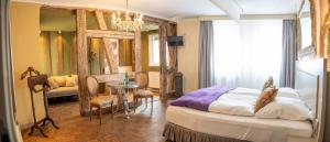 Postel nebo postele na pokoji v ubytování Friedrich von Schiller Hotel