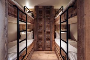 Postel nebo postele na pokoji v ubytování Antarès URSA 001 - luxury apartment ski inski out