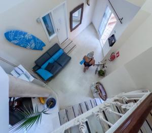 Televízia a/alebo spoločenská miestnosť v ubytovaní Duque Nest Hostel