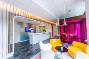 TV a/nebo společenská místnost v ubytování Prize by Radisson, Antwerp City