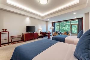 TV a/nebo společenská místnost v ubytování HeBei Cuipingshan Guest House