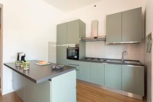 Kuchyň nebo kuchyňský kout v ubytování Casa Levante - Near the station and city center