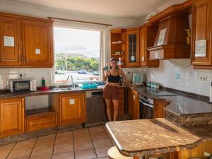 Kuchyňa alebo kuchynka v ubytovaní Duque Nest Hostel
