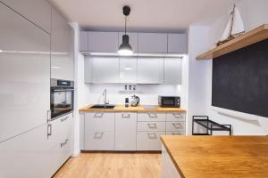 Dapur atau dapur kecil di Apartament Marcel