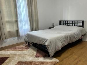 Ένα ή περισσότερα κρεβάτια σε δωμάτιο στο 1Bedroom Unit in Mesatierra Garden