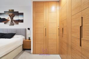 Posteľ alebo postele v izbe v ubytovaní weforyou Isla de Poniente 2 Bedrooms and Parking