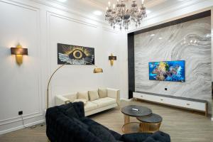 Televisor o centre d'entreteniment de Sea View Boulevard Apartment