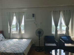 Voodi või voodid majutusasutuse Happy Stays A - Sunset View at SMDC Hope Residences toas