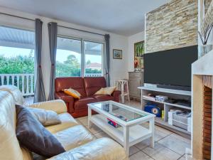 Et tv og/eller underholdning på Holiday Home Eden Parc by Interhome