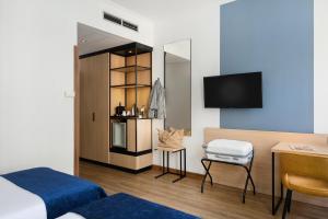 TV a/nebo společenská místnost v ubytování Hotel Bristol Budapest