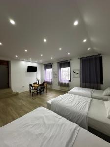 En eller flere senge i et værelse på VDM Ferienwohung Pfungstadt