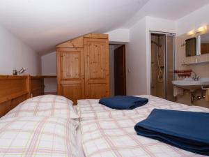 Posteľ alebo postele v izbe v ubytovaní Apartment Bischofsmütze by Interhome