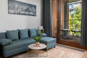 Posedenie v ubytovaní ApartHotel Kolejowa Apartamenty