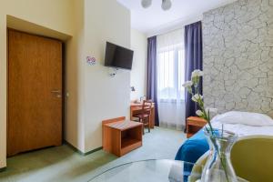 TV a/nebo společenská místnost v ubytování Hotel Dom Marynarza