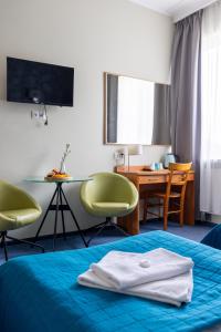 TV a/nebo společenská místnost v ubytování Hotel Dom Marynarza