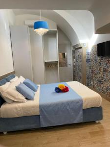 Postel nebo postele na pokoji v ubytování San Nicola Suite & mini apartment