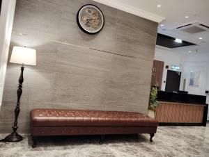 Posezení v ubytování De Quinton Hotel