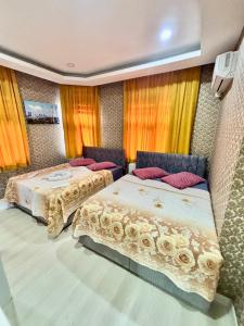 Cama o camas de una habitación en İmmortal Hotel İstanbul