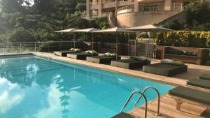 Bazén v ubytování Hôtel et Résidence Costa Rossa nebo v jeho okolí