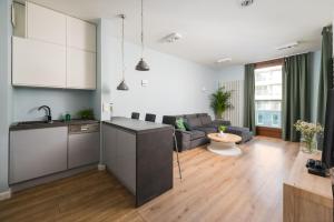 Kuchyň nebo kuchyňský kout v ubytování GO Apartments - ApartHotel