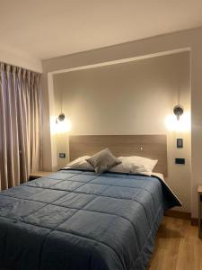 Postel nebo postele na pokoji v ubytování KAPAC HOME cusco + 10 fotografií