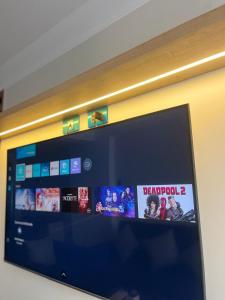 TV a/nebo společenská místnost v ubytování KAPAC HOME cusco
