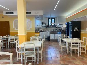 Kuchyň nebo kuchyňský kout v ubytování Hotel Ristorante StellAmiata