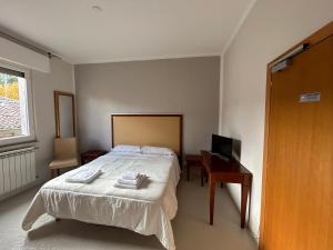 Postel nebo postele na pokoji v ubytování Hotel Ristorante StellAmiata