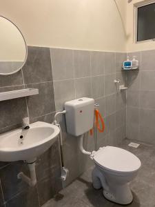 Ένα μπάνιο στο Homestay RumahKita di Seri Iskandar