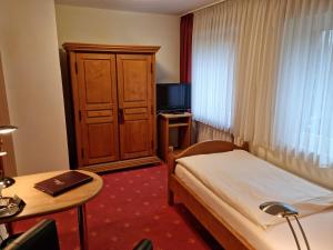 Postel nebo postele na pokoji v ubytování Hotel Landhaus Berghof