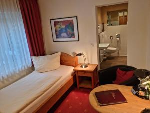 Postel nebo postele na pokoji v ubytování Hotel Landhaus Berghof