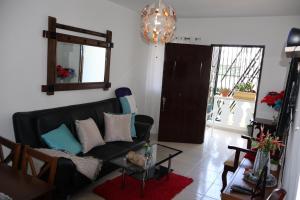 Χώρος καθιστικού στο Apartamento céntrico en la ciudad de Puerto Plata, RD